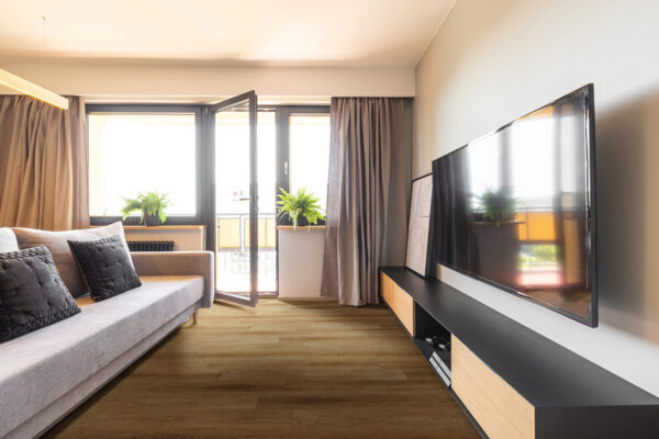 Dark brown lvp flooring, room scene.